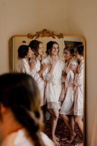 Washington wedding photographer capturing tthe bride getting ready at The Barn on Hinman in Cashmere, Washington