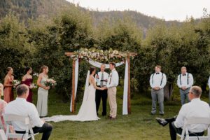 Washington wedding photographer documenting the wedding ceremony at The Barn on Hinman in Cashmere, Washington