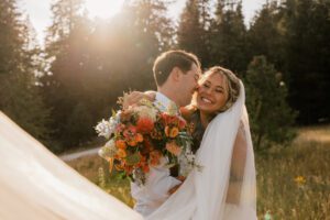 Bride and groom enjoying golden hour at Brown Family Homestead, a wedding venue in Leavenworth, Washington