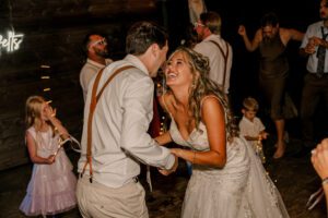 Washington wedding photographer capturing the couple dancing at Brown Family Homestead in Leavenworth, Washington