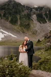 Couple taking elopement portraits at Bagley Lakes