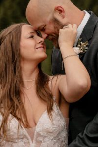 Romantic couple taking elopement portrait at Mt Baker