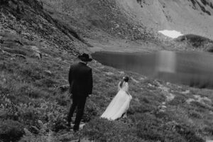 Couple taking elopement portraits at Bagley Lakes