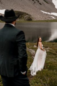 Couple taking elopement portraits at Bagley Lakes