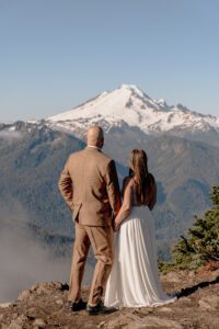Couple eloping at Winchester Fire Lookout, overlooking Mt Baker