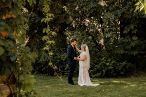 Washington wedding photographer documenting an emotional first look at Brown Family Homestead in Leavenworth, Washington