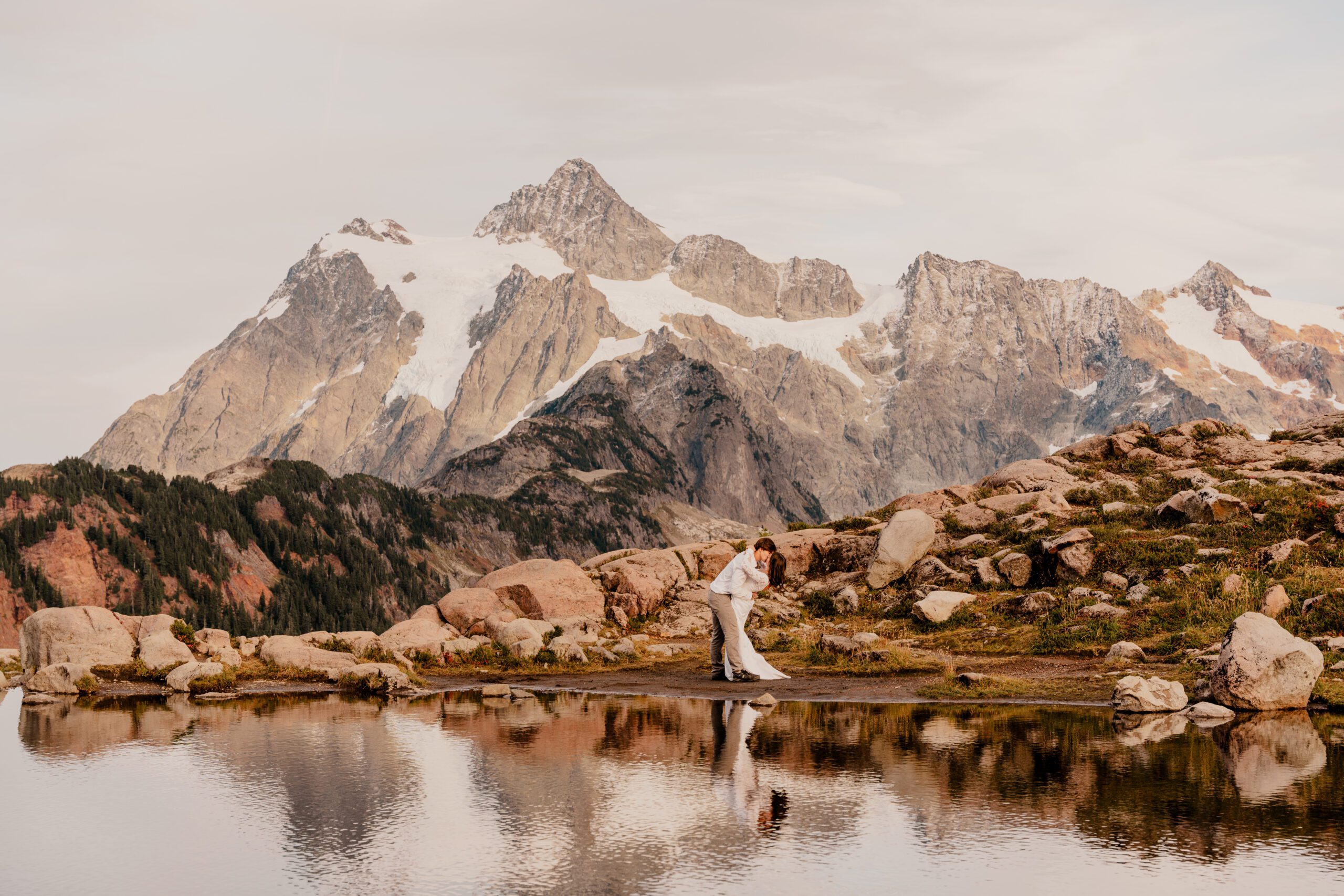 Washington elopement photographer documenting a couple exploring Artist Point in Mt Baker Snoqualmie National Forest