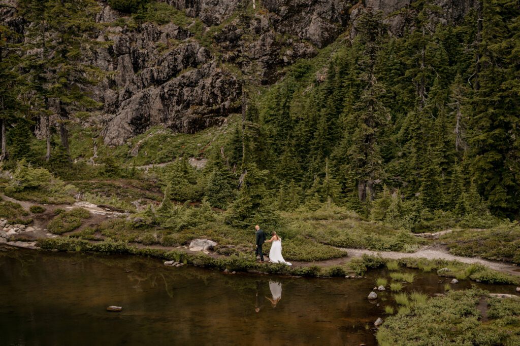 An eloping couple exploring the Bagley Lakes area of the Mt. Baker Wilderness.