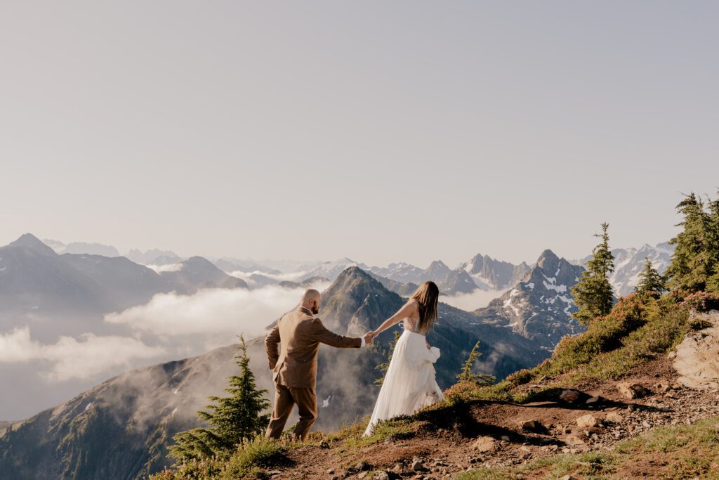 During their elopement, the married couple hikes along the ridge line at Winchester Mountain Fire Lookout.