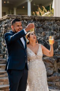 Washington wedding photographer documenting the couple giving a toast at Beecher Hill House in Leavenworth, Washington