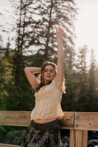Ethereal senior portraits of a girl on the bridge in Leavenworth, Washington