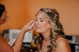 Embellished by Britt doing the bride's makeup at Brown Family Homestead