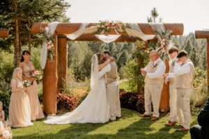 First kiss during the ceremony at Pine River Ranch